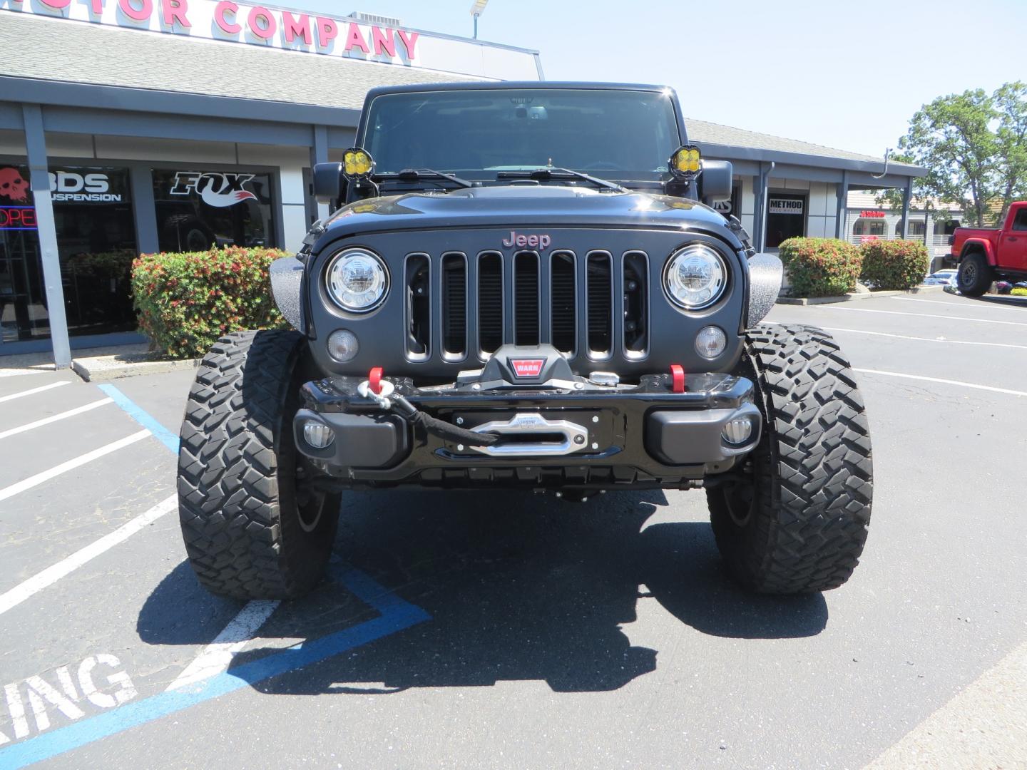 2017 BLACK /BLACK Jeep Wrangler Unlimited Rubicon 4WD (1C4BJWFG5HL) with an 392 Hemi Swapped engine, located at 2630 Grass Valley Highway, Auburn, CA, 95603, (530) 508-5100, 38.937893, -121.095482 - !!!!!!!!!!! NOT FOR SALE IN CA !!!!!!!!!!!!!! 392 Hemi swapped JK with a ton of extras...... Teraflex Long arm suspension system, Fox 2.0 remote reservoir shocks, Fox ATS steering stabilizer, Teraflex bump stops, Limit straps, Adams front and rear drivelines, Teraflex exhuast spacer, Dakota Custo - Photo#1